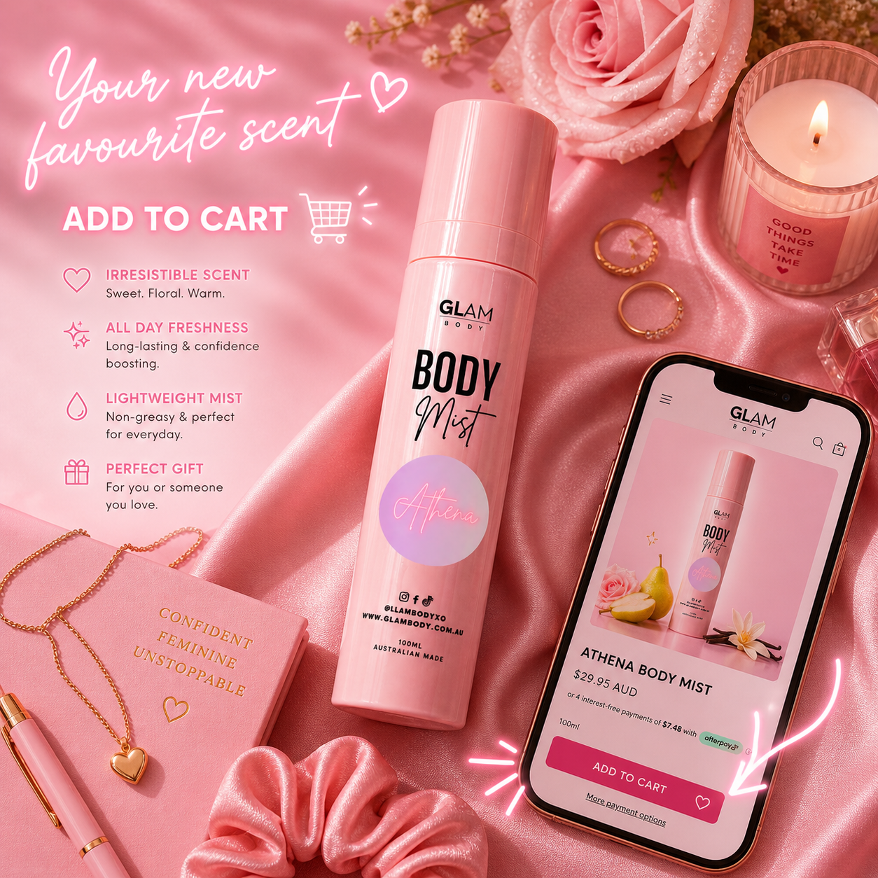 Pink body mist bottle with smartphone displaying product on pink fabric background