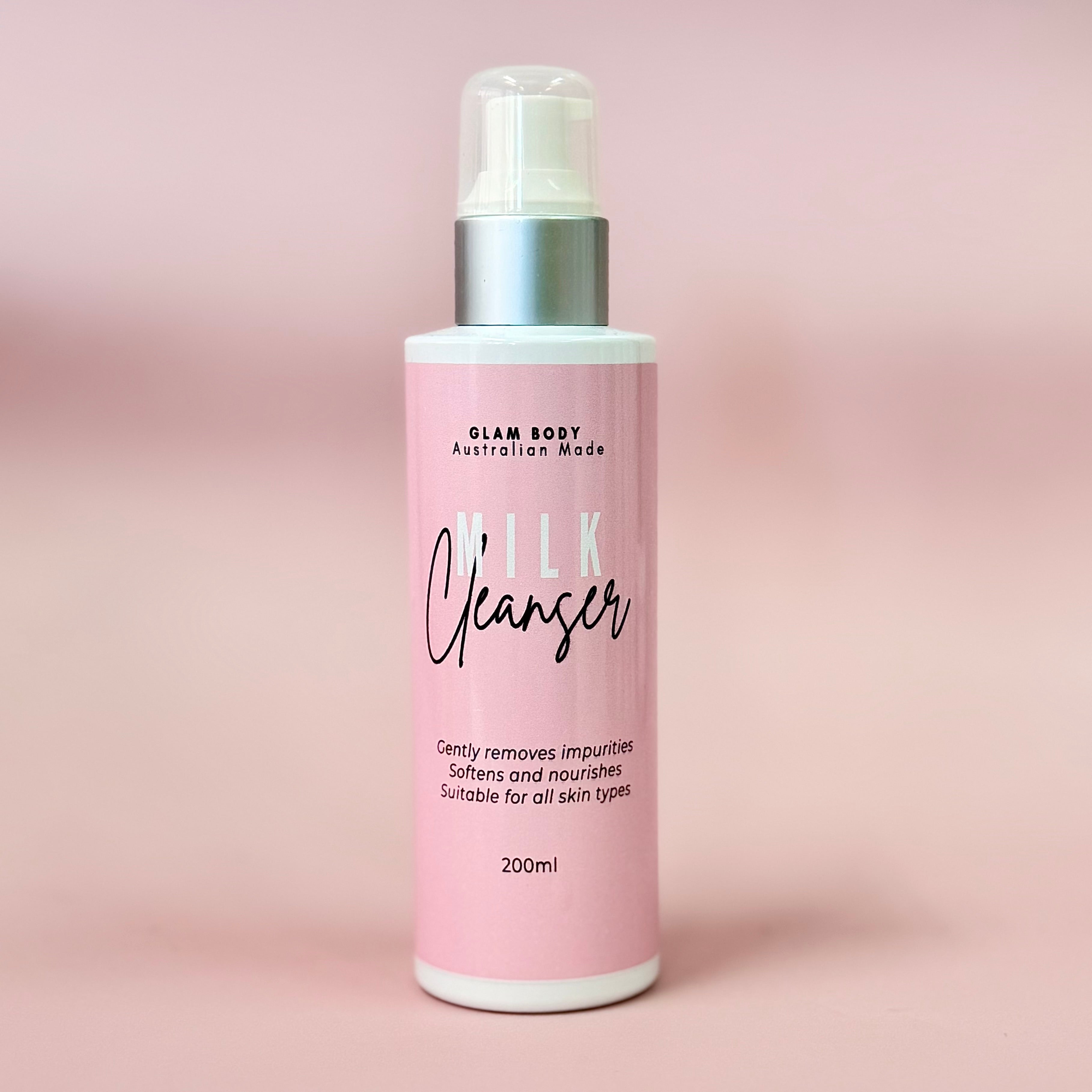Pink bottle of Glam Body Milk Cleanser on a pink background