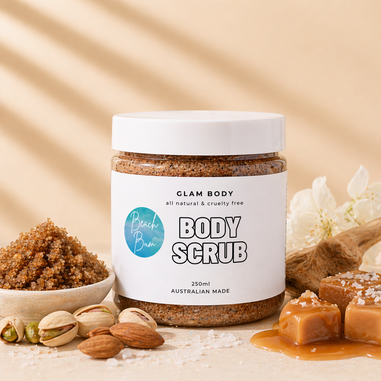 Jar of Glam Body Body Scrub with ingredients on a beige background