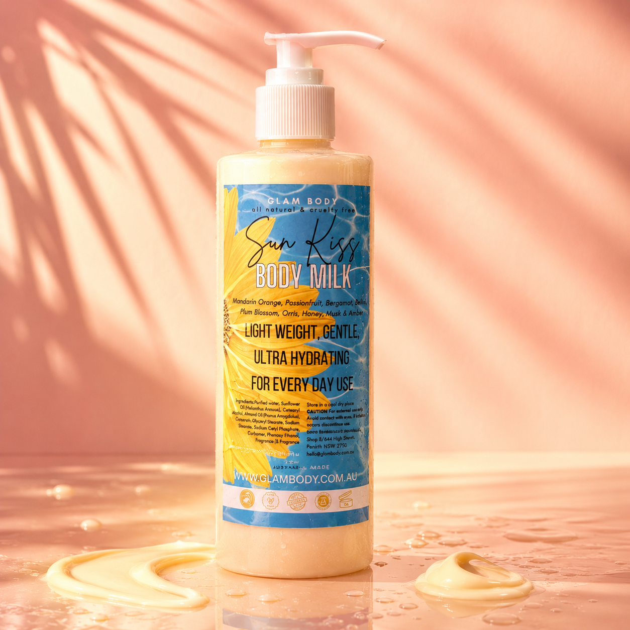 Sun Kiss Body Milk bottle on a peach background