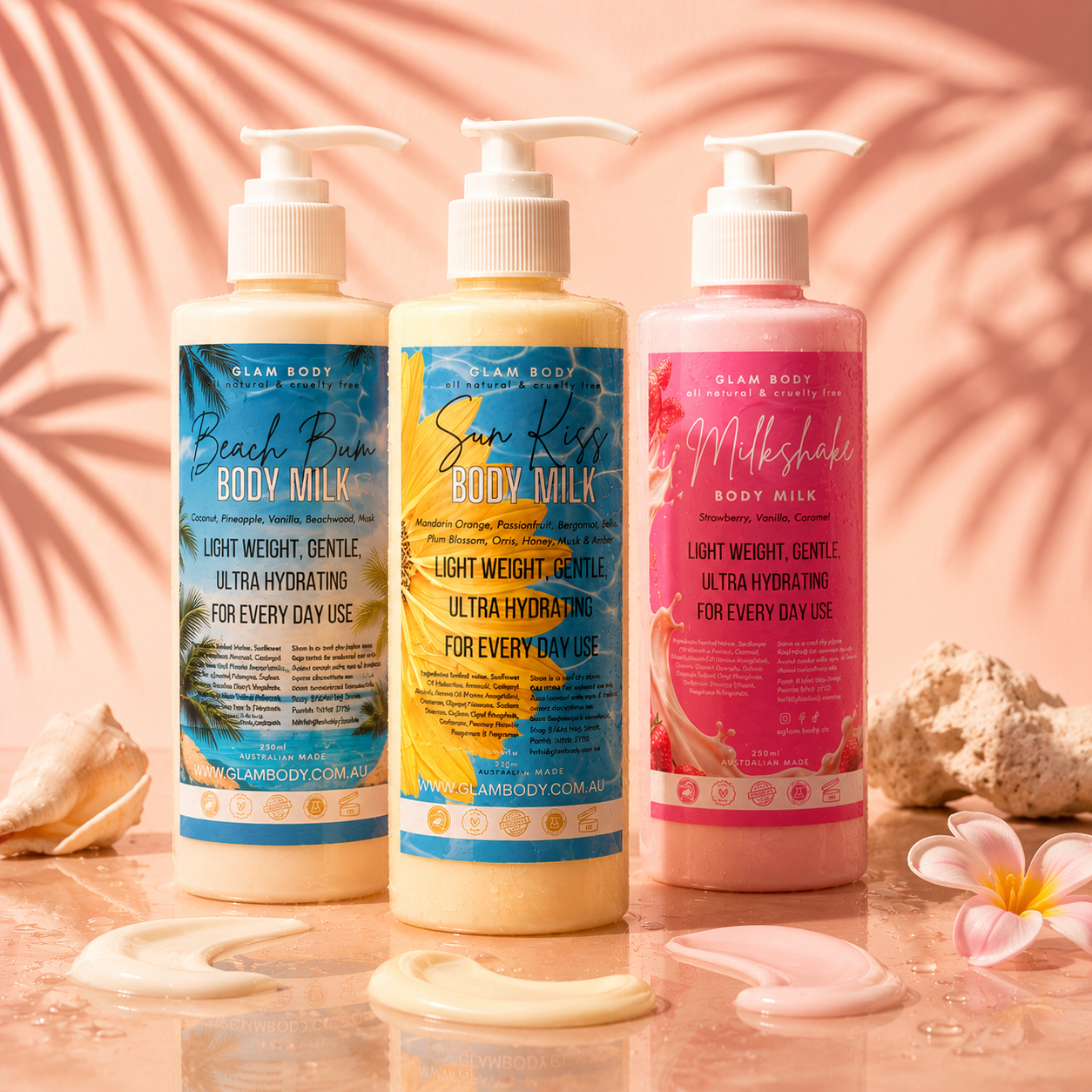 Three bottles of Glam Body body milk with colorful labels on a wooden surface.