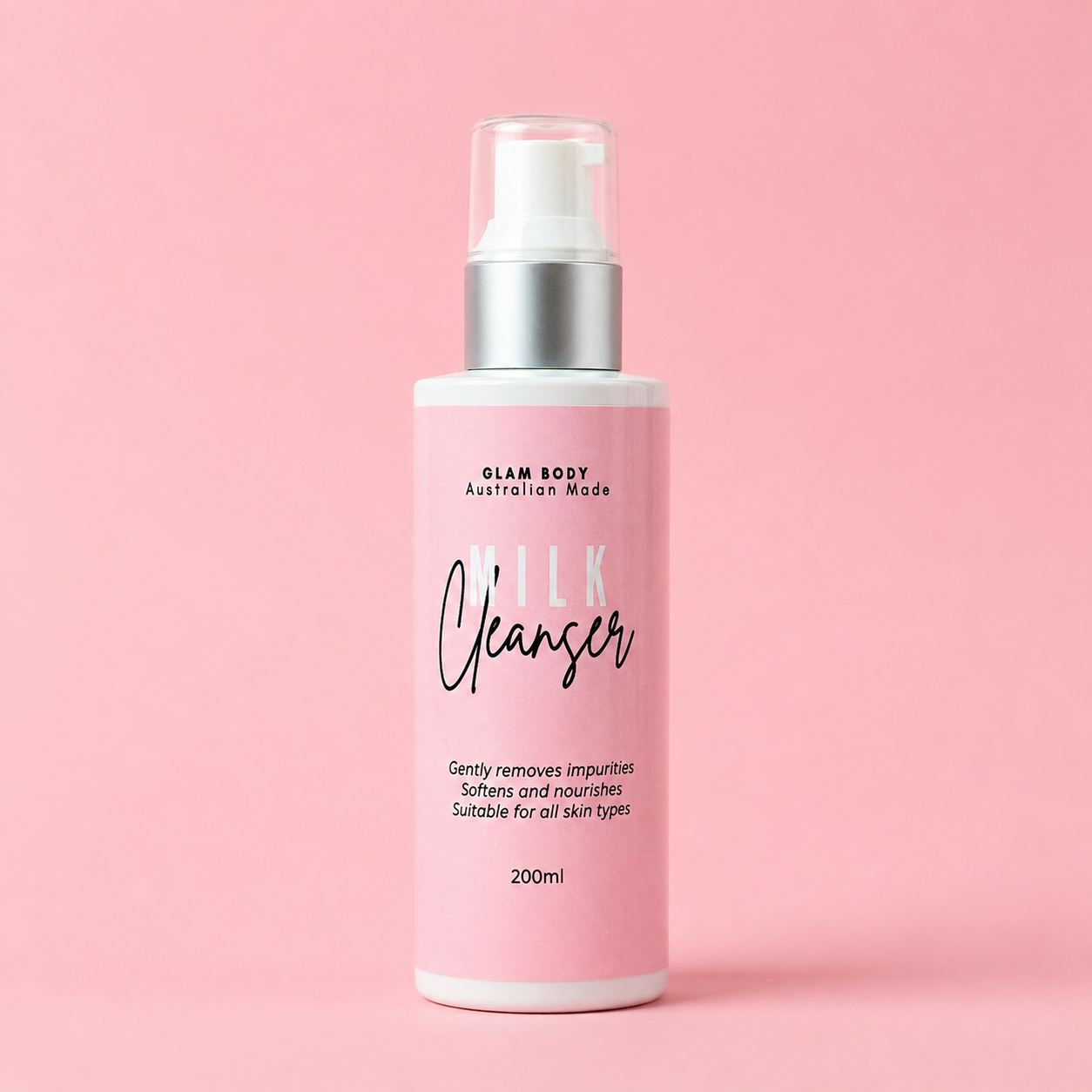 Pink bottle of 'ilk Cleanser' on a pink background