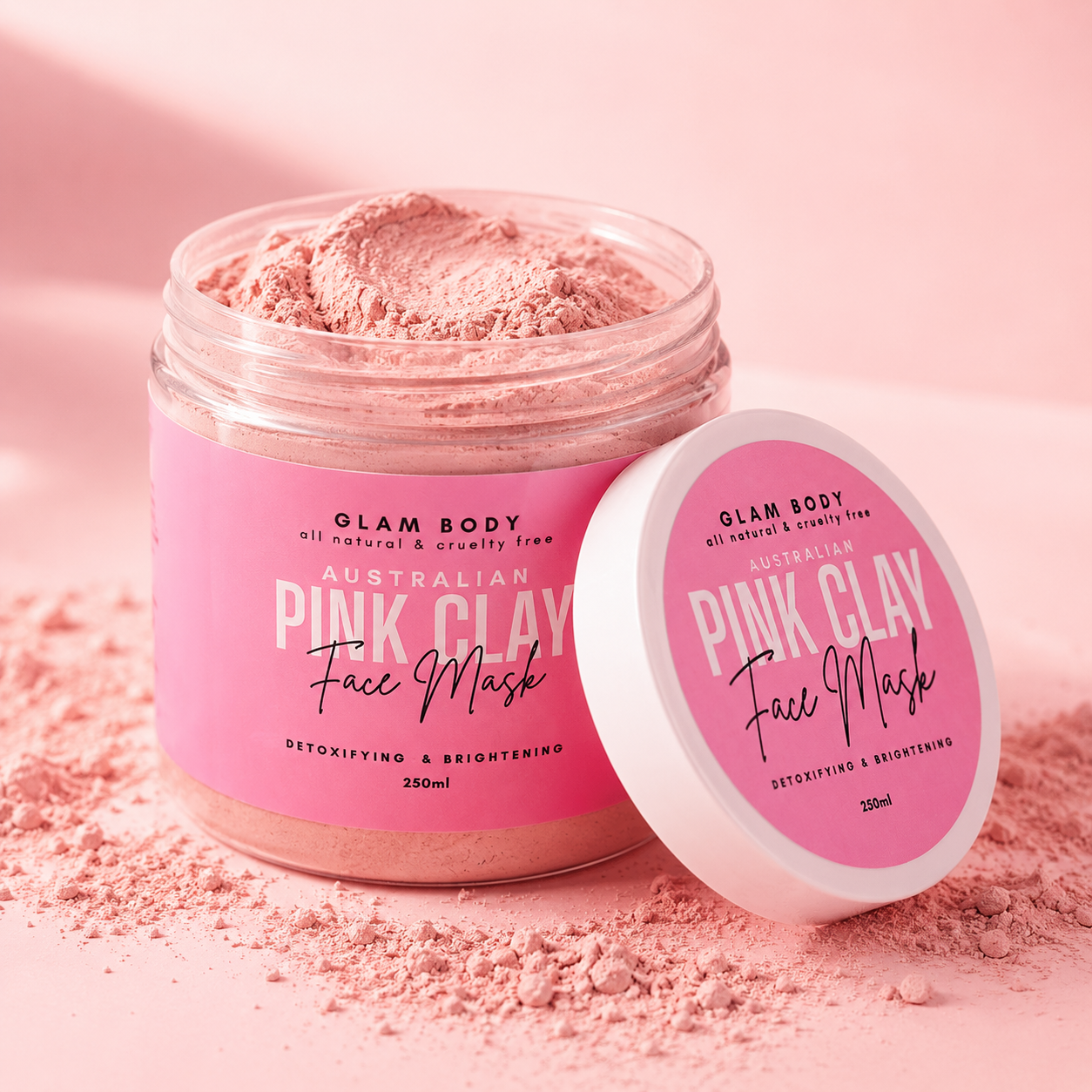 Pink clay face mask in a jar with a pink label on a pink background