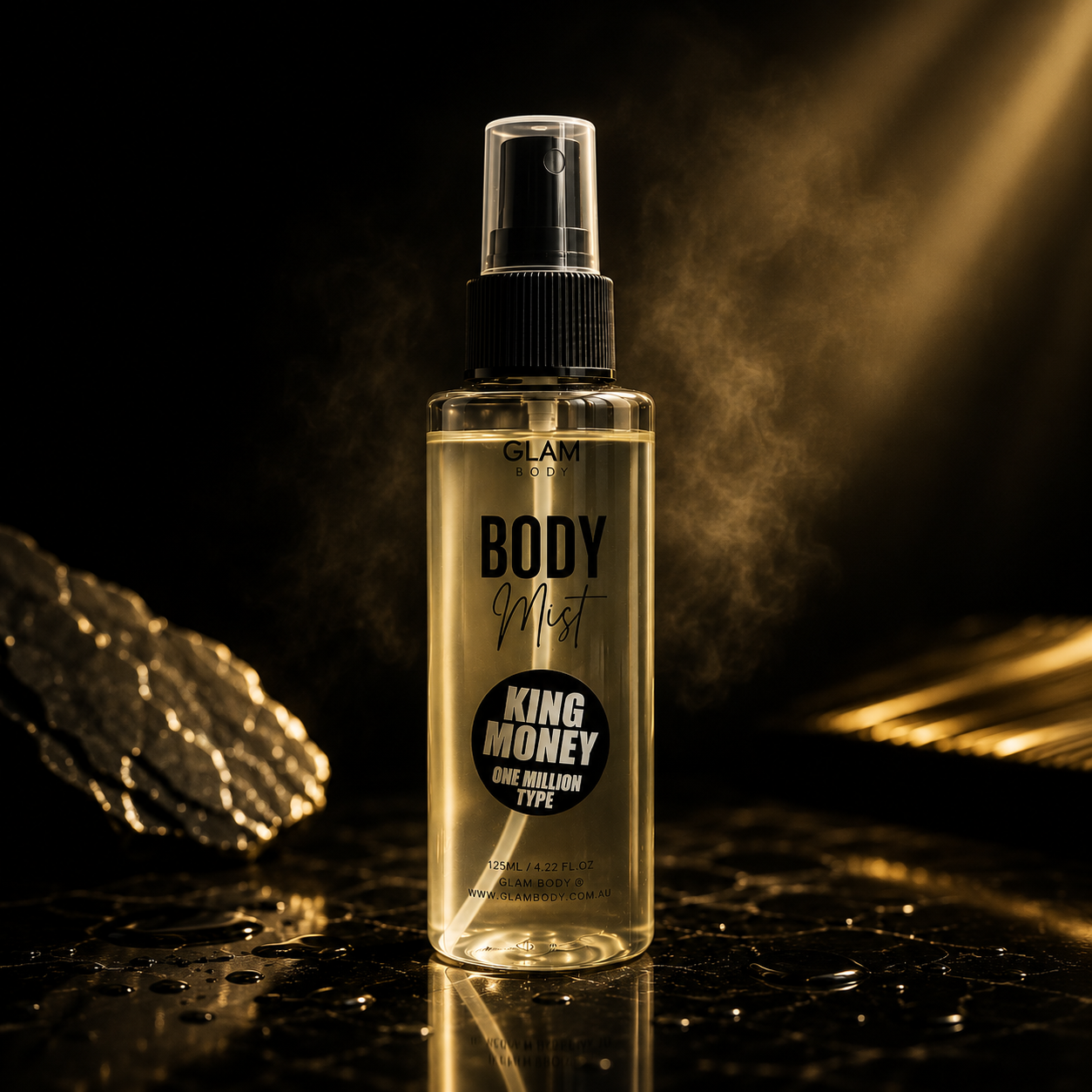 Body mist spray bottle labeled 'King Money' on a reflective surface with dark background