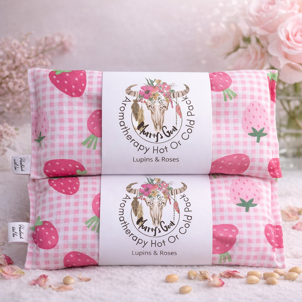 Two pink and white patterned hot or cold packs with a brand label on a light background.