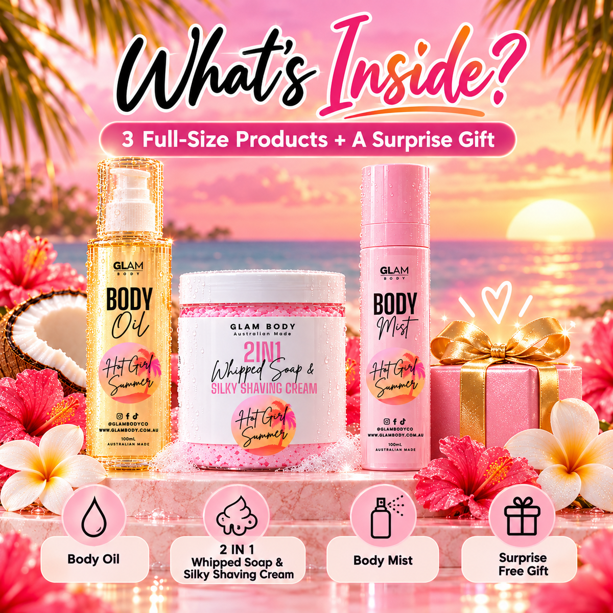 A promotional beach-themed graphic showing three Glam Body products arranged on a pink platform with flowers and a sunset ocean background. The products are a gold bottle labeled Body Oil, a white tub labeled 2-in-1 Whipped Soap & Silky Shaving Cream, and a pink canister labeled Body Mist.